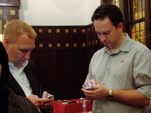 Jared Benson and friend Andy texting Jared Benson and friend Andy texting